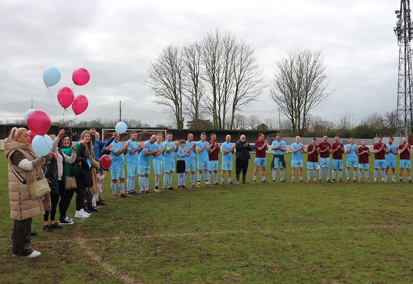 Scott's family let off balloons during a minute's applause at the start of a memorial match at Mangotsfield United in March