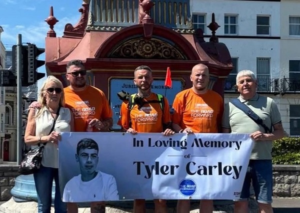Mark Carley (centre) with mum Jacqueline, brothers Shaun and Thomas, and dad Tom in Weymouth