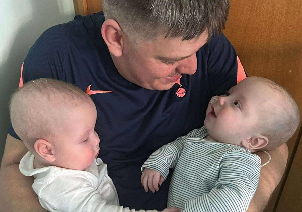 Craig Bright with twins Ray (left) and Louie.